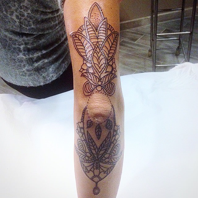 mandala elbow tattoo