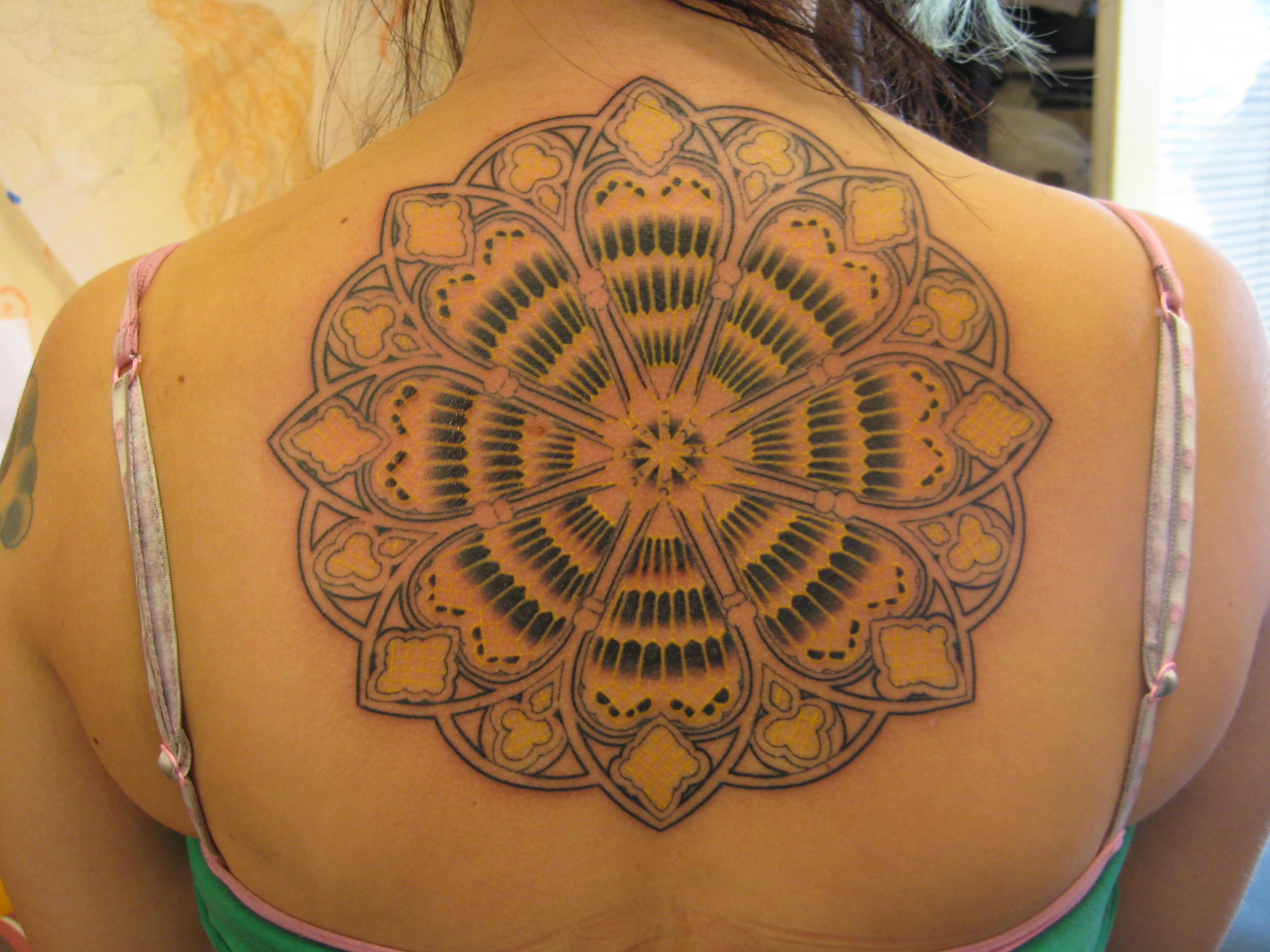 mandala tattoo on back11