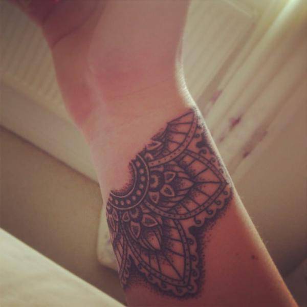 mandala tattoo on wrist