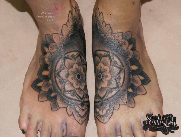 mndala foot tattoo design
