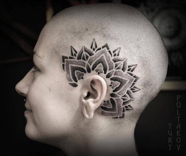 small mandala tattoo on head 