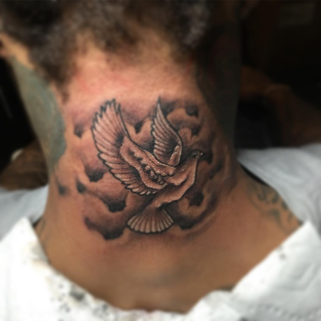 dove neck back tattoo