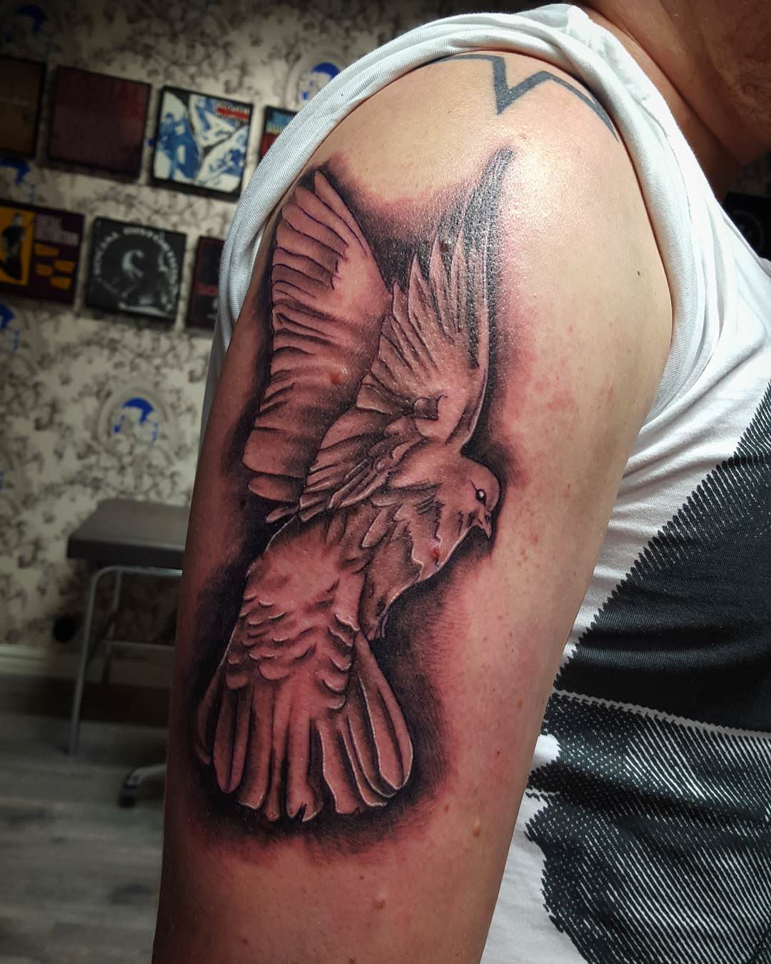 flying dove tattoo on sleeve1