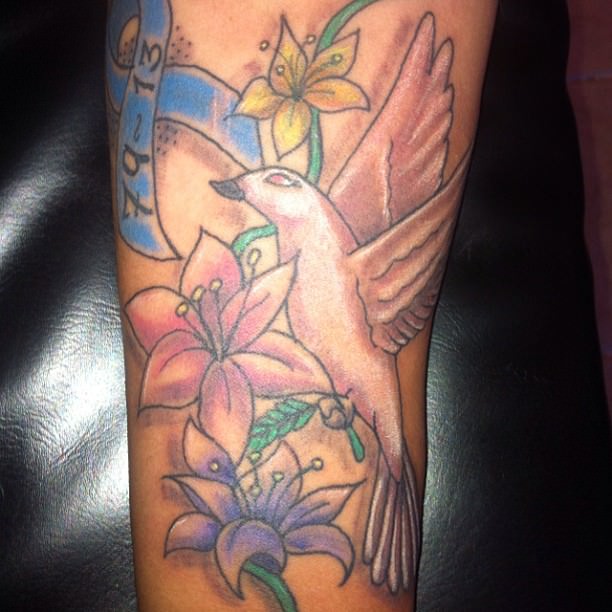 white dove tattoo on arm design