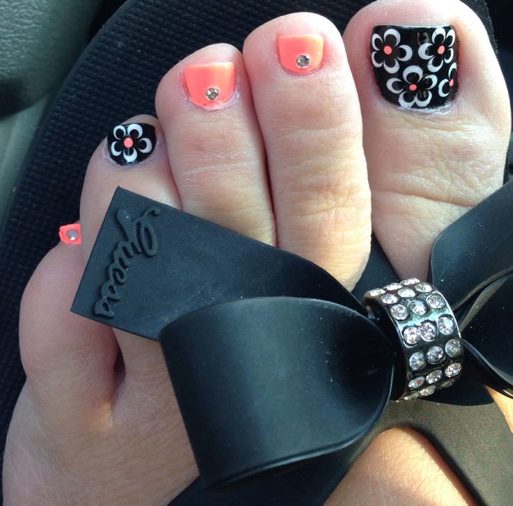 black flower toe nail design