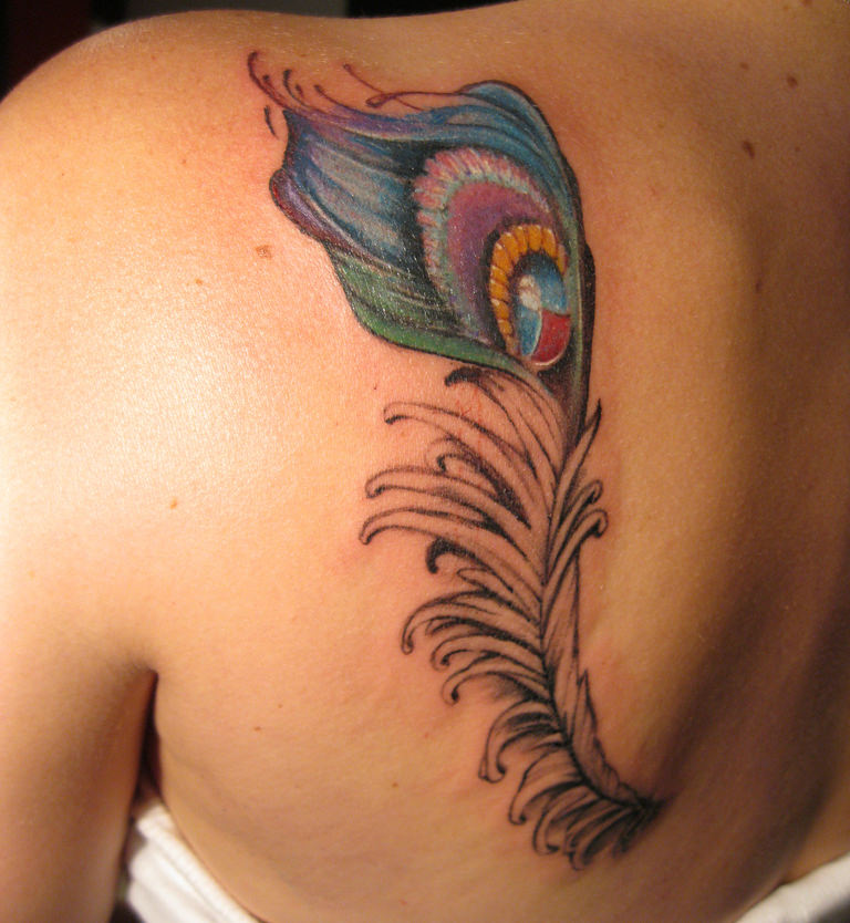 peacock feather tattoo on back