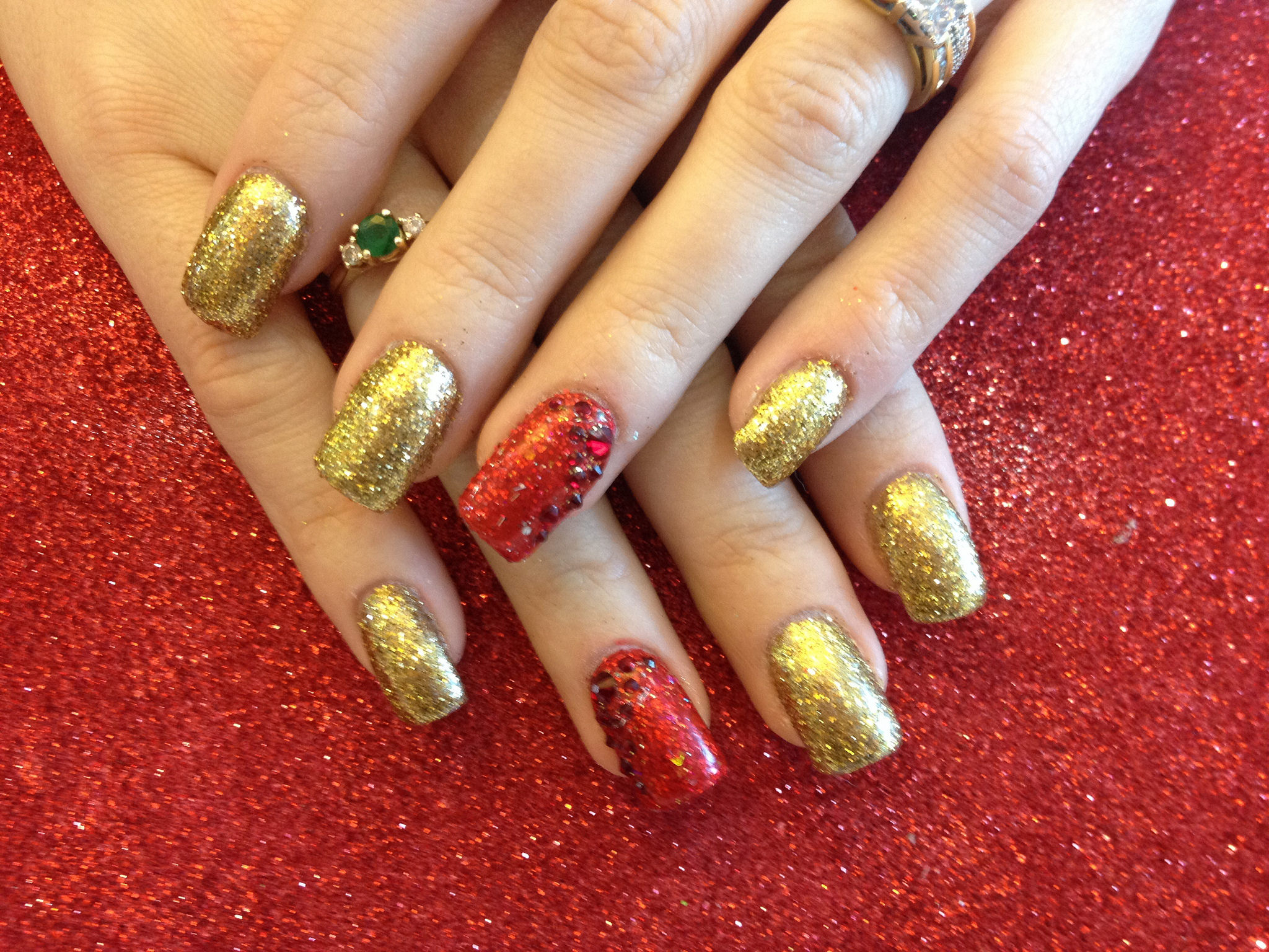 gold glitter acrylic nail design
