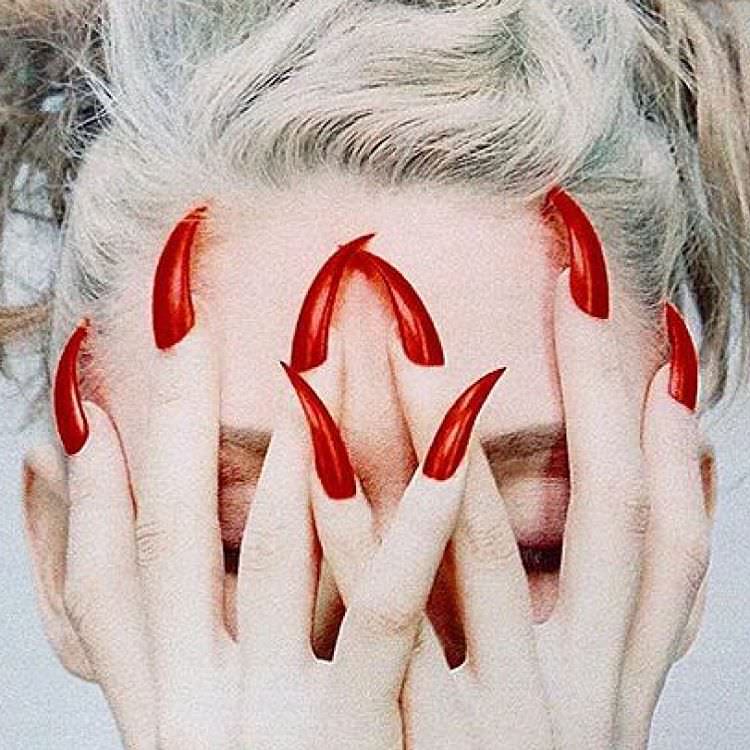 spiky long red nails
