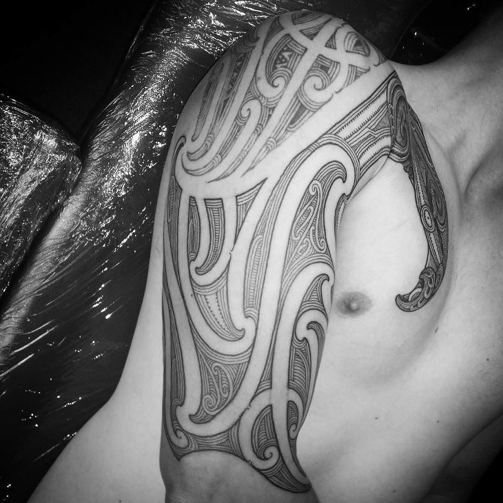 black and white swirl tattoo
