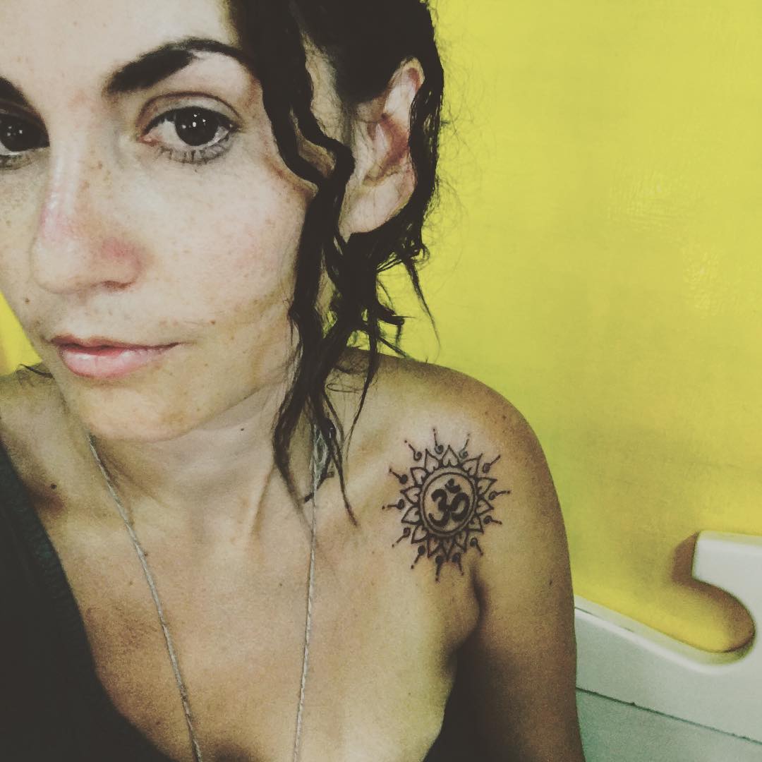 small sun mandala tattoo