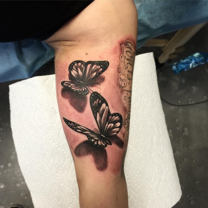 black and gray butterfly tattoo