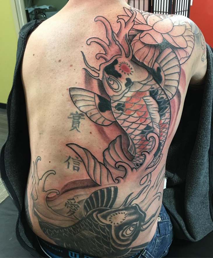 koi fish cover up tattoo idea