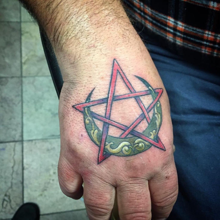 star tattoo design on plam