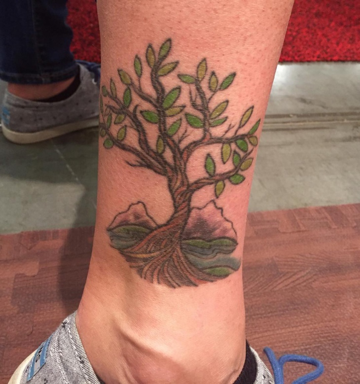 tree tattoo design on leg