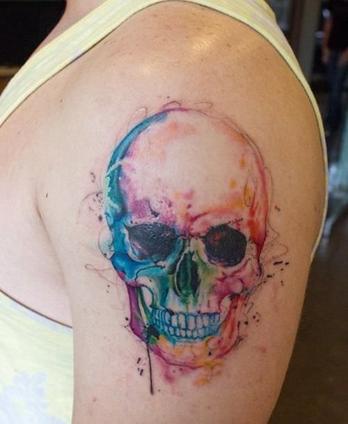skull tattoo on arms
