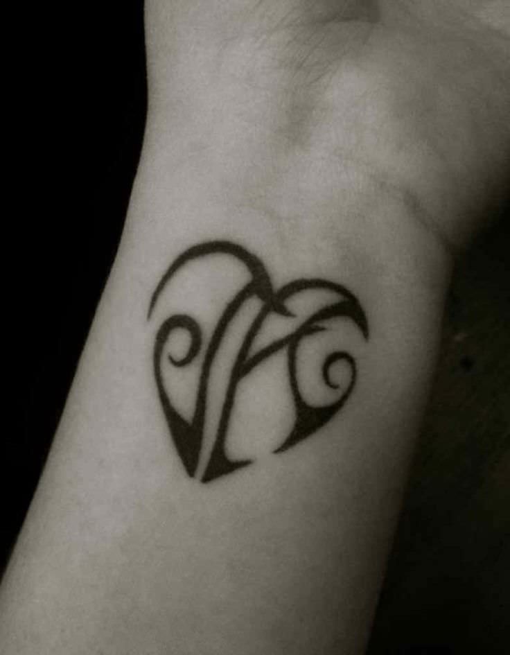 small heart tattoo
