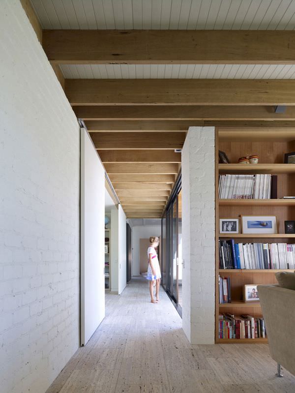 interior design with rafters and white bricks