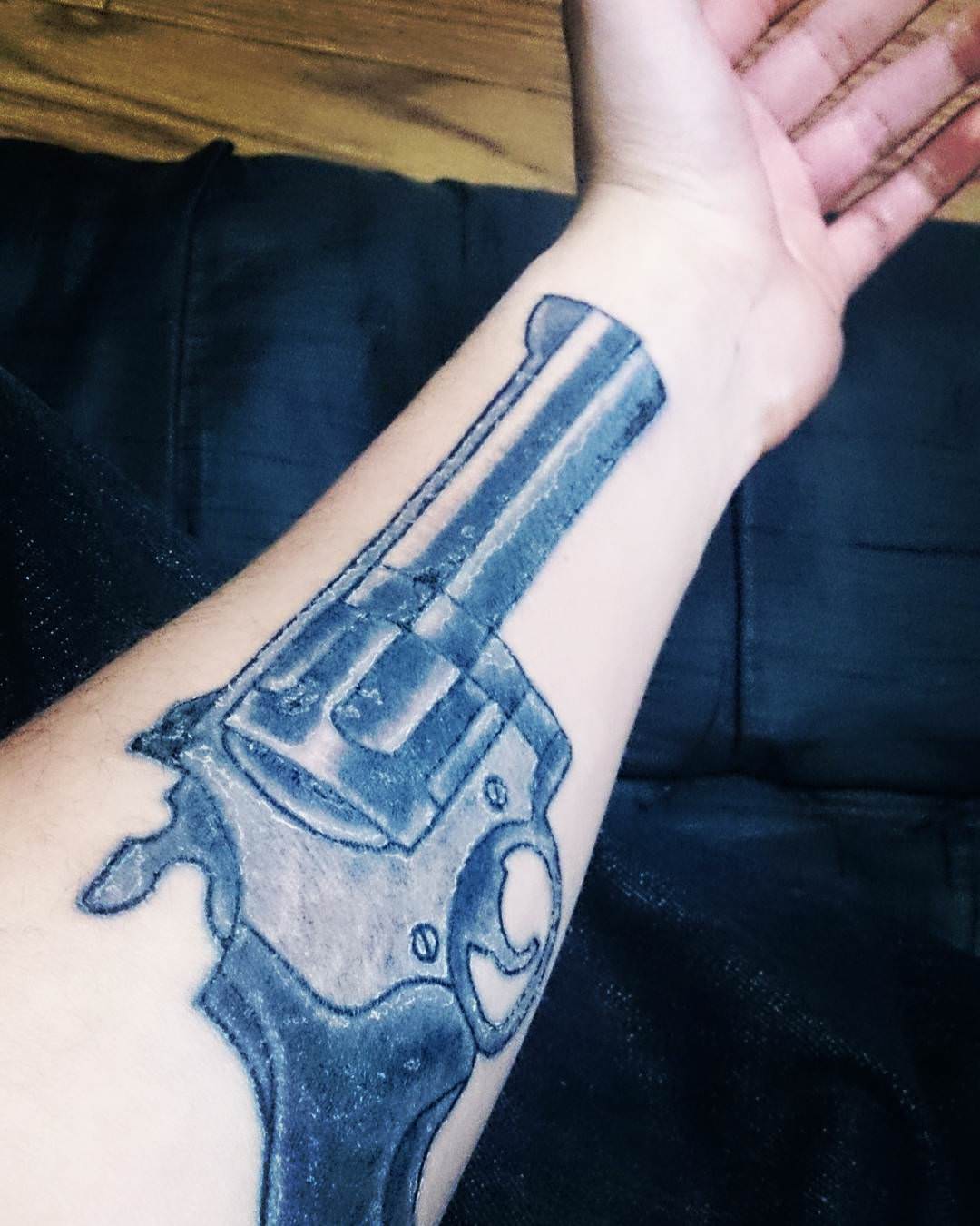 left hand gun tattoo designs