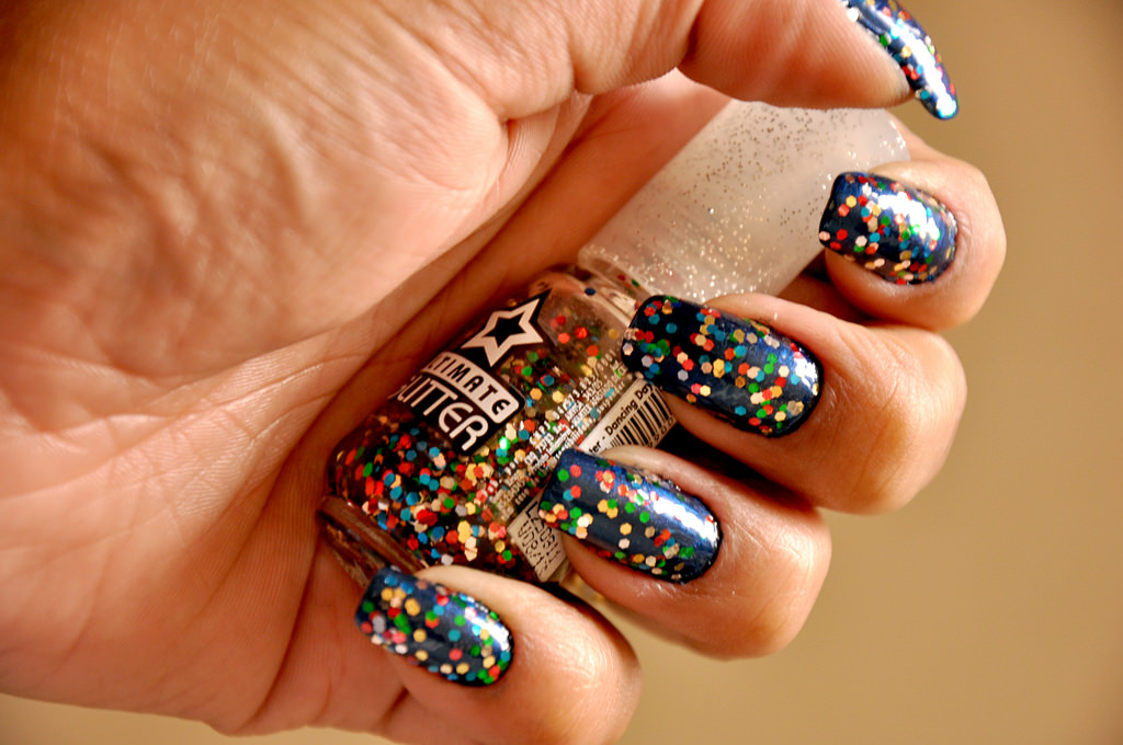 glitter nail design with diamond