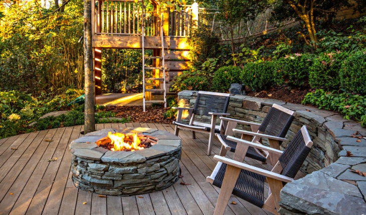 rustic deck with fireplace