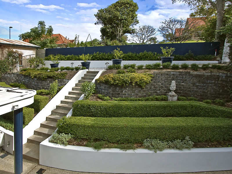 hedging brick wall garden design