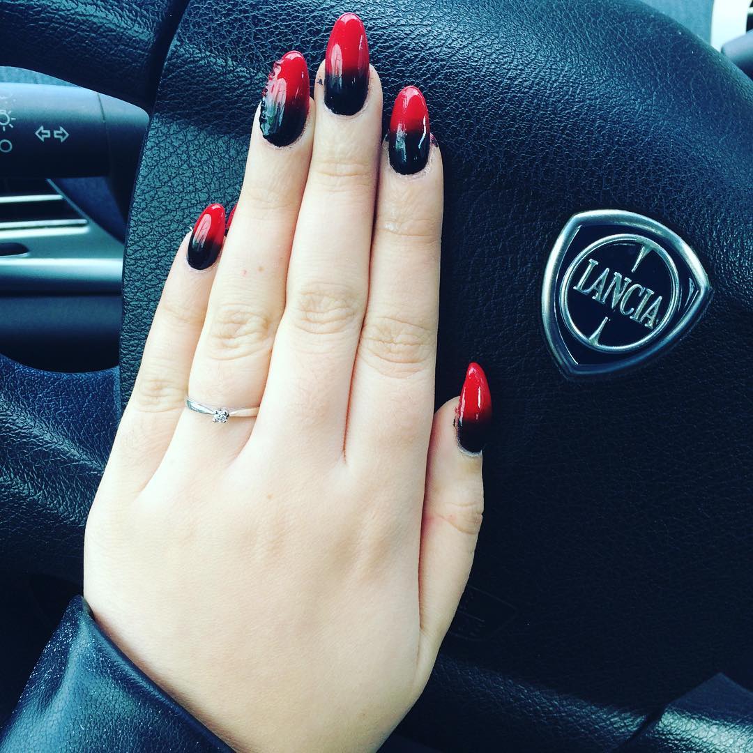 glitter black and red nail design