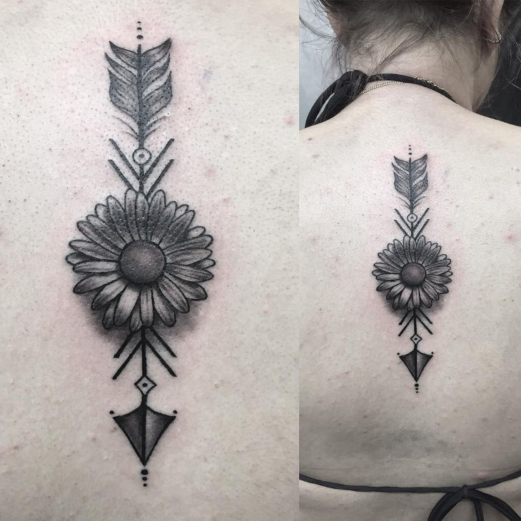 simple daisy and arrow tattoo