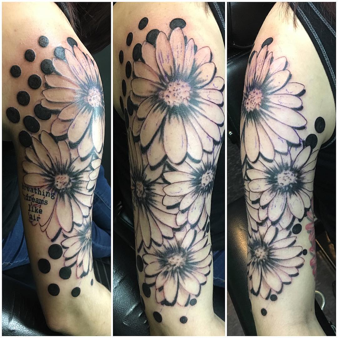 big flower sleeve tattoo