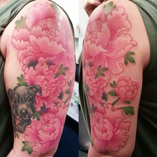 light pink flower sleeve tattoo