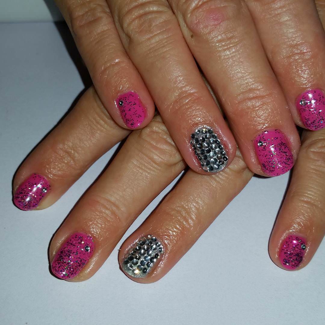 black pink and silver nail design