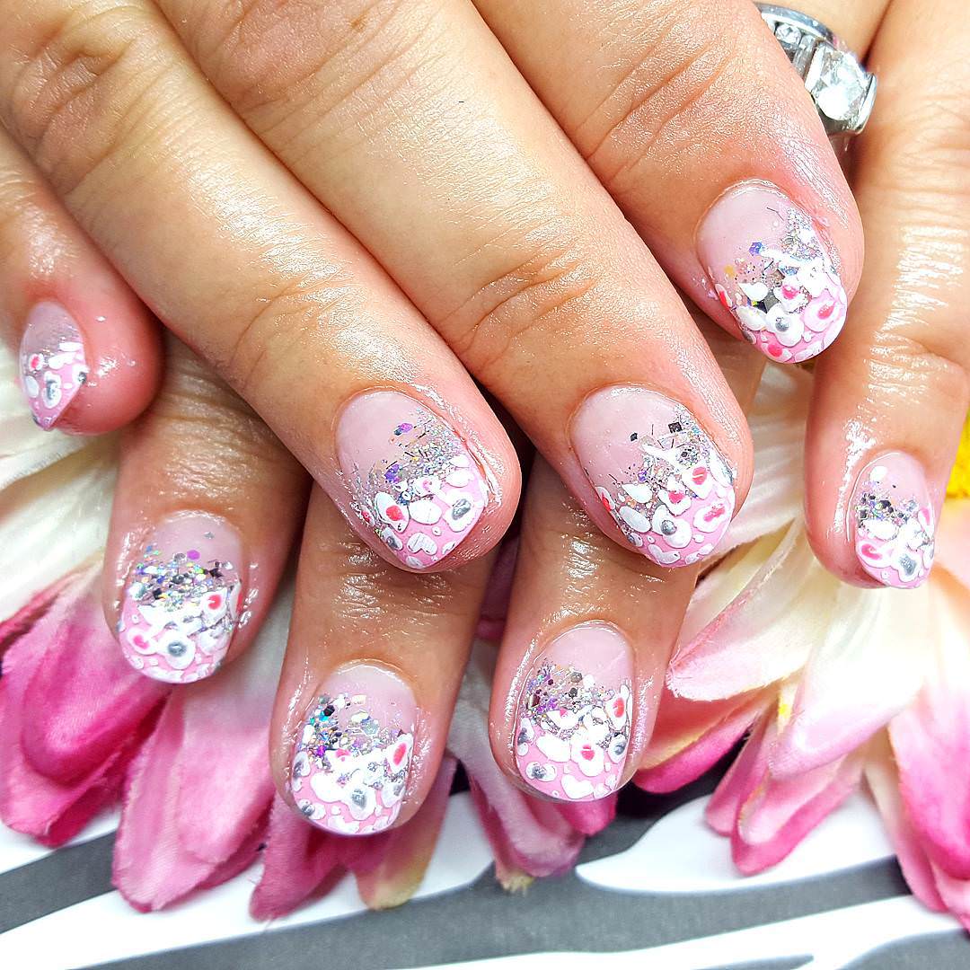 simple pink and silver nail design