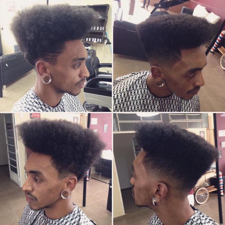 afro bush fade cut with part