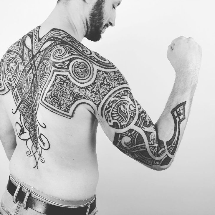viking tribal spine tattoo