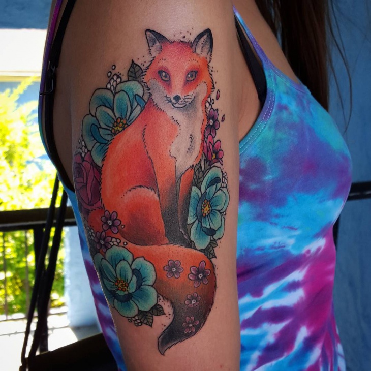 fun little fox with flower tattoo