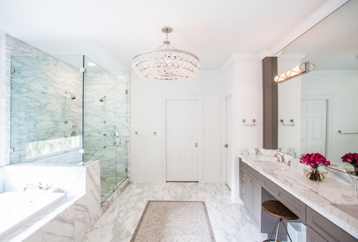 white bathroom with bling chandelier