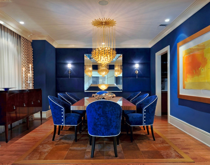 dark blue dining room with chandelier