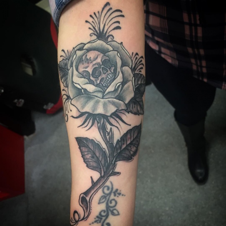 unique rose tattoo design