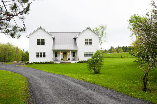 farmhouse exterior design with green 