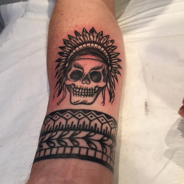 tribal band with skull tattoo