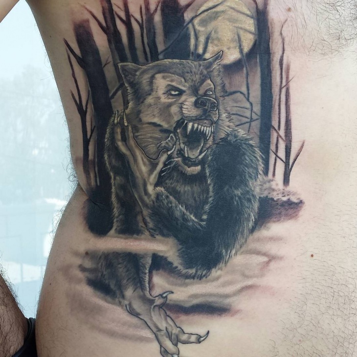 roaring wolf tribal tattoo