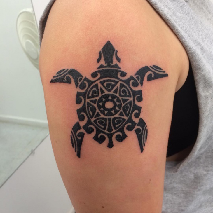 small tribal turtle tattoo design on right hand