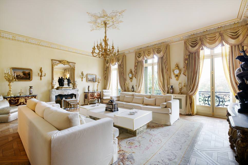 living room with gold color curtains