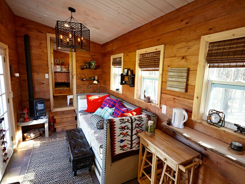 tiny house living room with wood paneled walls