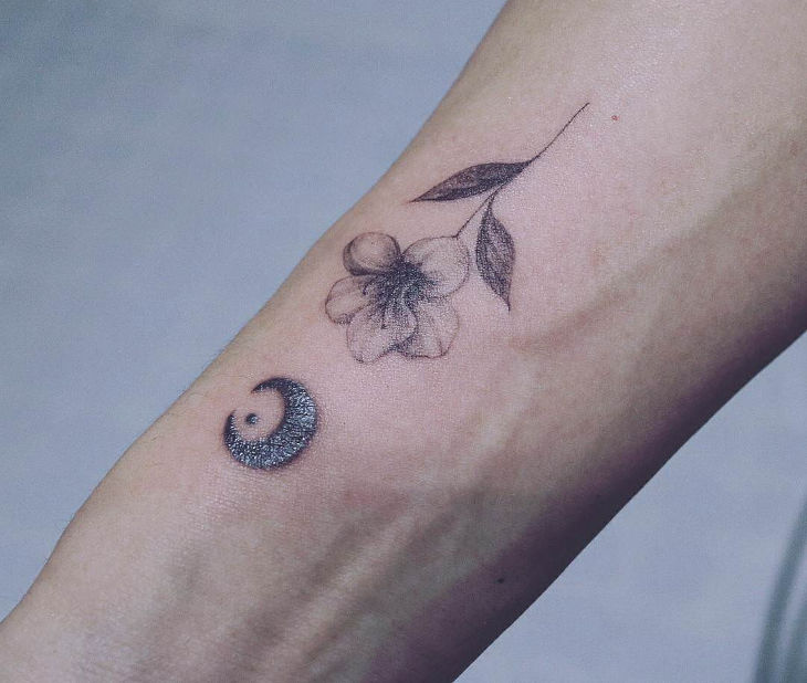 amazing delicate flower tattoo