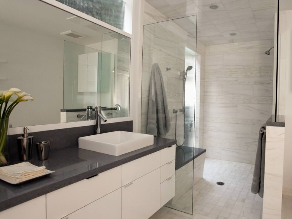 modern white bathroom with dark gray splash