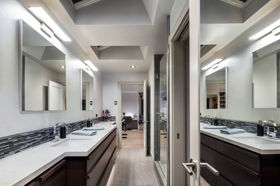 white modern narrow bathroom design with skylights
