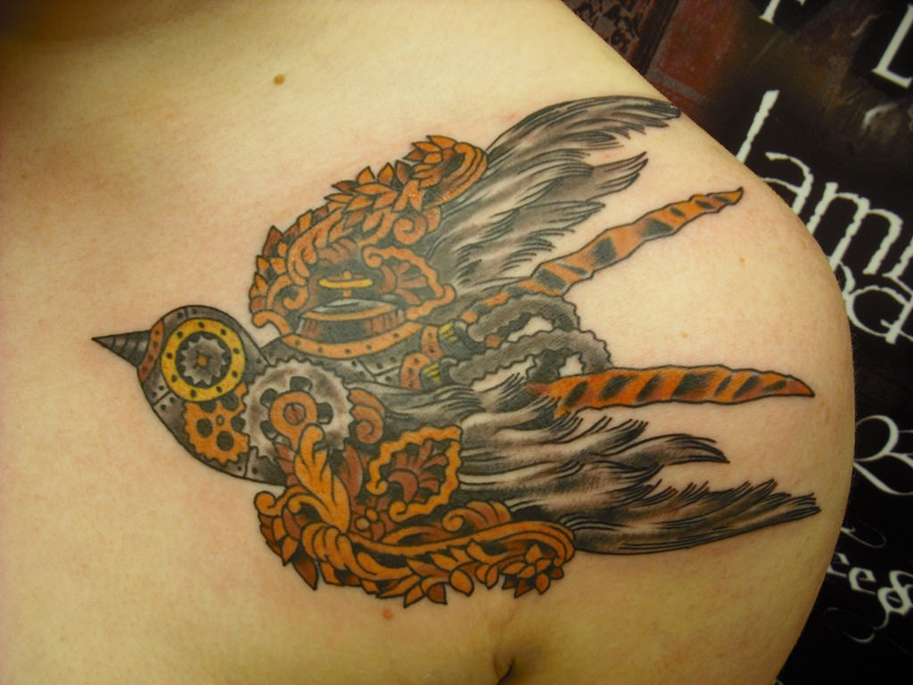 flying bird steampunk tattoo design