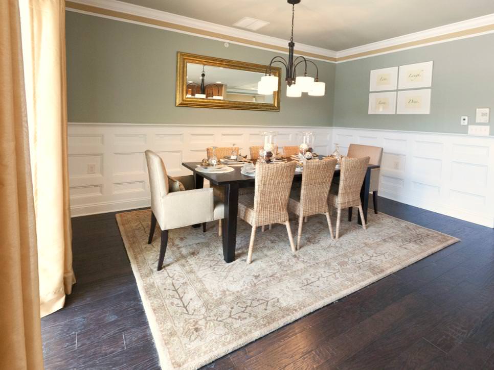 transitional dining room with white wainscoting