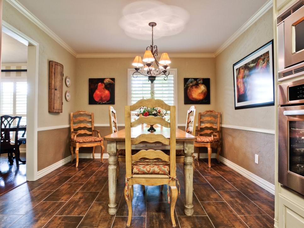 transitional dining room with decorative chairs