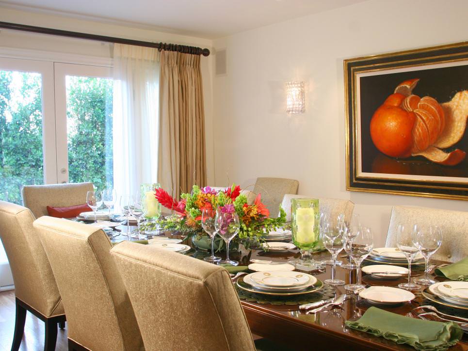 elegant neutral dining room with artwork
